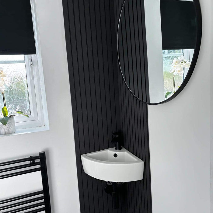 Black Slatwall panel in a downstairs bathroom 